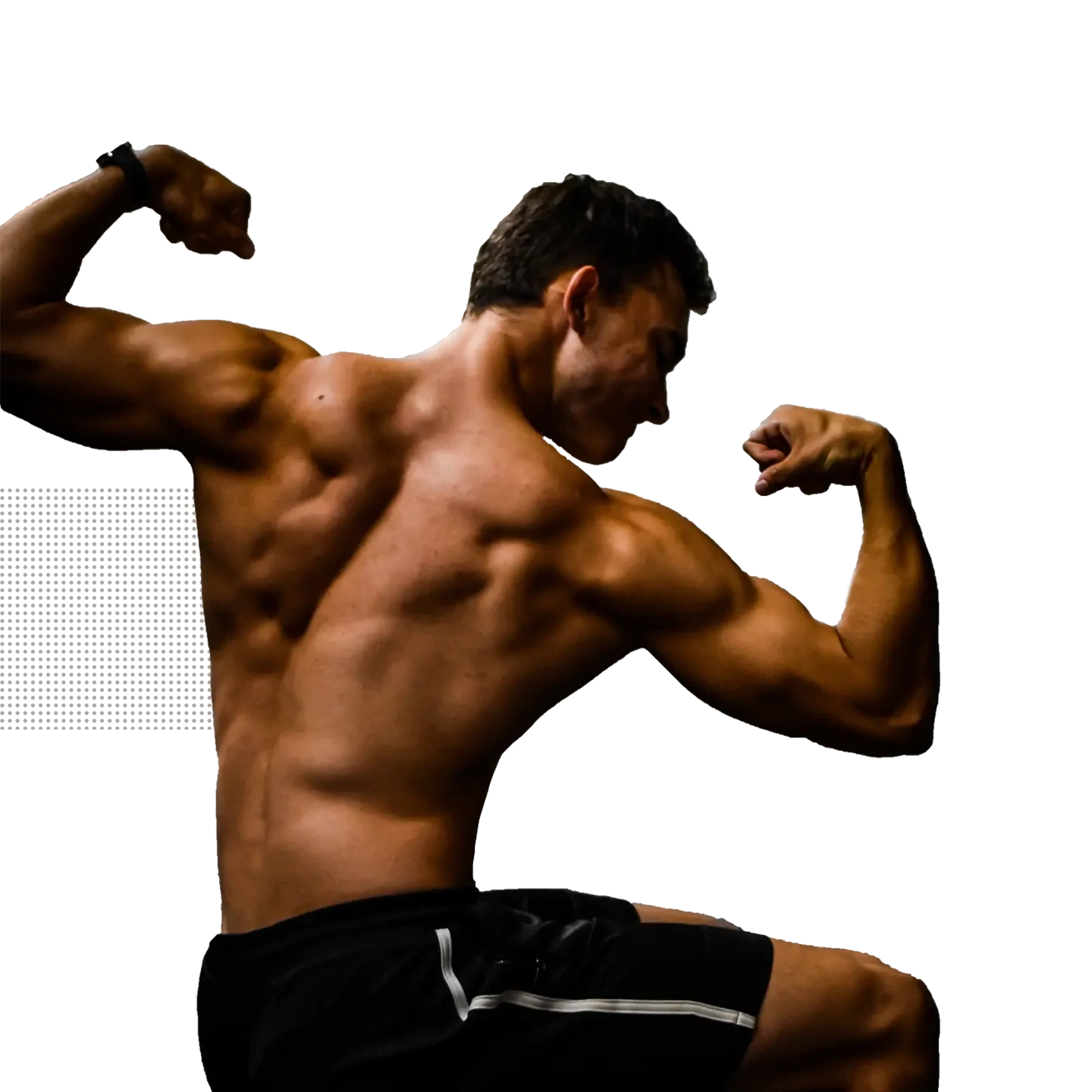 Coach Sebastian posing in a sitting back double biceps pose